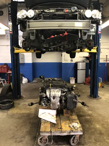 Engine pulled and ready for installation in the shop